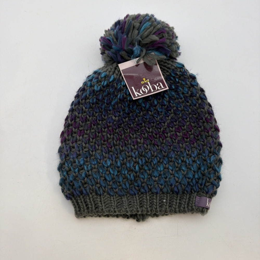 Kooba knit pom-pom beanie featuring a multi-colored